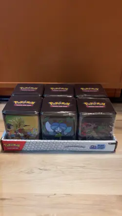 Pokemon TCG: Stacking Tins 2025 Factory Sealed 6 Tin Box With Store Display Case - Image 1