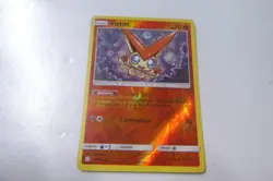 Pokemon Card S&M Cosmic Eclipse Victini Holo 30/236 - Image 1