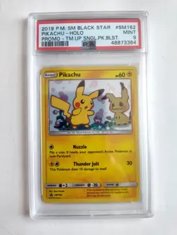 Pokemon Sun & Moon Team UP Black Star Promo PIKACHU #SM162 -PSA 9 Mint - Image 1