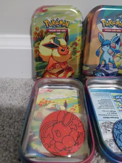 Prismatic Evolutions Tins Full Set Eeveelutions No Packs. Tin, Card, Coin - Image 2