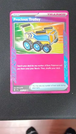Precious Trolley 185/191 Sv08: Surging Sparks ACE SPEC Holo Pokemon Trainer - Image 1