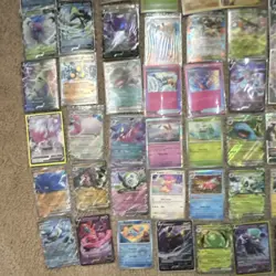 HUGE Pokemon lot old cards, new cards, oversized cards, and figurines - Image 5