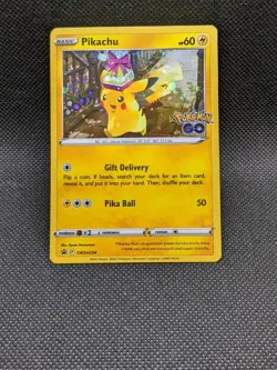 PIKACHU SWSH234 Cosmos Holo Rare Tin Promo Pokemon Go Pokemon Card Near Mint - Image 1