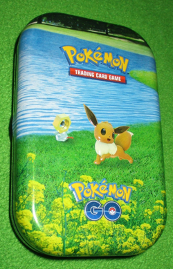 Pokemon Go Trading Card Game TCG Empty Mini Card Tin Eevee #133 Art Card & Coin - Image 1
