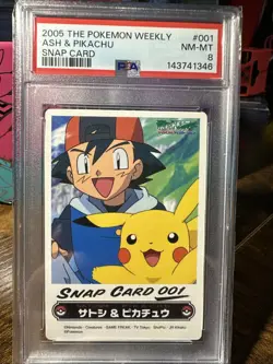 2005 Pokemon #001 Ash & Pikachu The Pokemon Weekly Snap Card PSA 8 - Image 1