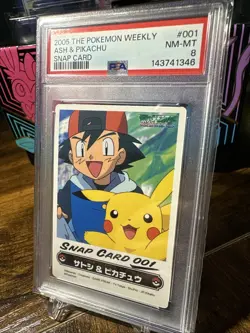 2005 Pokemon #001 Ash & Pikachu The Pokemon Weekly Snap Card PSA 8 - Image 2