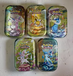 Pokemon Set of 5 S&V Prismatic Evolutions Mini Tins. Brand New Sealed. - Image 1