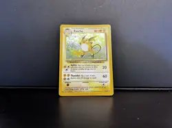 Raichu 14/102 Base Set Unlimited Holo Rare Vintage LP WOTC Pokemon Card - Image 1