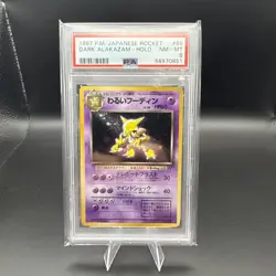 PSA 8 DARK ALAKAZAM 1997 Team Rocket #065 Japanese HOLO Pokemon Card - Image 1