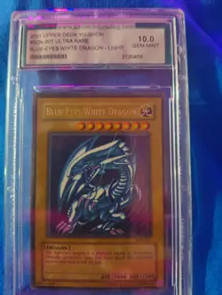 Blue eye white dragon light yu Gi Oh card 2001 - Image 1