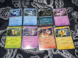 Pokemon TCG Prismatic Evolutions Costco Mini Tin Cosmos Promo Cards Set Of 8 - Image 1