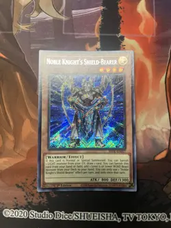 Yugioh Noble Knight’s Shield-Bearer - 1st Ed Secret Rare - (BROL-EN017) - Image 1
