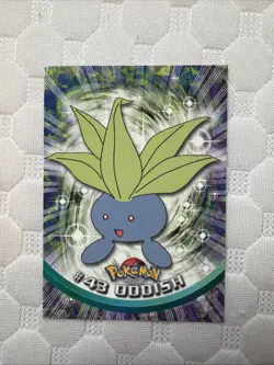Oddish #43 Pokemon 1999 Topps TV Animation Edition Series 1 Blue Logo - Image 1