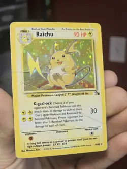 Pokemon TCG Raichu Fossil Holo Card 14/62 Damaged - Image 1