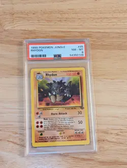1999 Pokemon TCG Jungle Set Rhydon Card #45 - PSA 8 NM MINT - Image 1