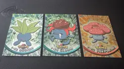 Oddish, Gloom, Vileplume Tri Pokemon Topps 1999 Series 1 Holo Foil Blue Label NM - Image 1