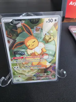 Pokemon TCG Eevee Prismatic Evolutions Black Star Promo Card ETB #173 - Image 1
