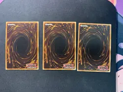 3x Masked HERO Atomic 1st Edition Super Rare MZMU-EN016 Yu-Gi-Oh! - Image 2