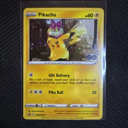 Pikachu SWSH234 NM Promo Card Cosmos Holo Pokemon Go - Image 1