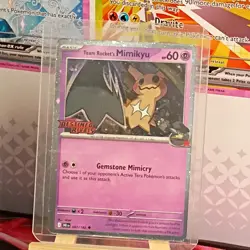 Pokemon Destined Rivals Team Rocket’s Mimikyu Stamped Promo 087/182 Cosmo Holo - Image 1