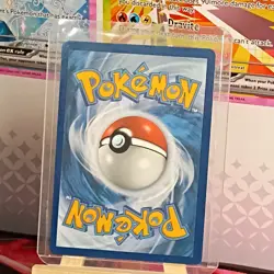 Pokemon Destined Rivals Team Rocket’s Mimikyu Stamped Promo 087/182 Cosmo Holo - Image 2