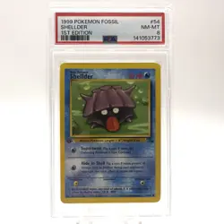 1999 POKEMON FOSSIL Trading Card SHELLDER #54/62 1ST EDITION graded slab PSA 8 - Image 1