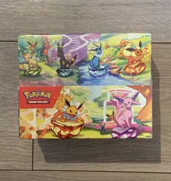 Pokemon TCG: Prismatic Evolutions Mini Tin Display Case | 8 Tins Sealed - Image 1
