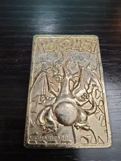1999 Pokemon 23K Gold plated Charizard card Burger King - Image 1