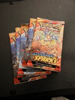 Pokemon Surging Sparks 5 Booster Pack Random Pack Art Bundle - Image 1