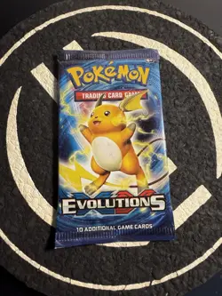 New Factory Sealed Pokemon Booster Pack XY Evolutions In Hand - Image 1