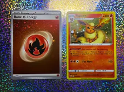 2020 Pokemon TCG Vivid Voltage Cosmos Holo 026/185 Flareon (With a Holo Swirl) - Image 1