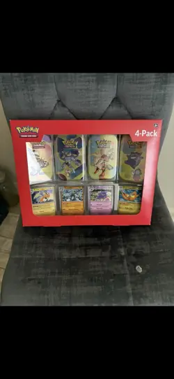Pokemon TCG Prismatic Evolutions 4-Pack Mini-Tin Bundle with Promo Cards - Image 1