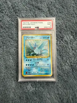 1997 POKEMON JPN FOSSIL #144 ARTICUNO-HOLO PSA 9 - Image 1