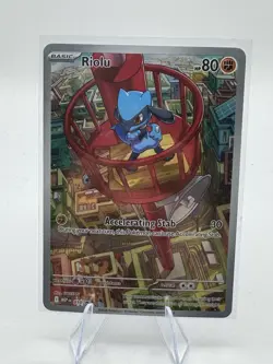 Pokemon TCG Mega Evolutions Riolu Black Star Promo Illustration Rare #10 NM - Image 1