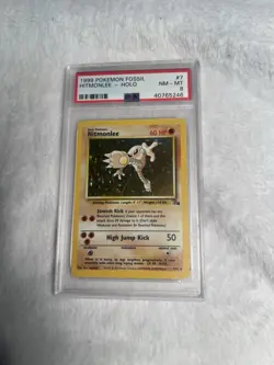Pokemon TCG Hitmonlee Fossil 7/62 Unlimited PSA 8 - Image 1