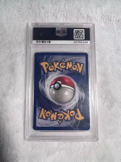 Pokemon TCG Hitmonlee Fossil 7/62 Unlimited PSA 8 - Image 2