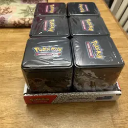 Pokemon TCG: Stacking Tins 2025 Factory Sealed 6 Tin Box With Store Display Case - Image 1