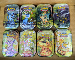 Pokemon TCG Prismatic Evolutions Mini Tin Complete Set of 8 Factory Sealed Tins - Image 1