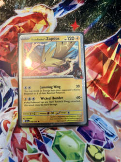 Pokemon TCG - Team Rocket's Zapdos 070/182 Gamestop Exclusive Promo NM - Image 1