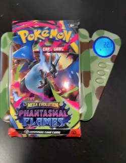 22.7g HEAVY Pokemon TCG: Mega Evo Phantasmal Flames Pack SEALED Charizard Art - Image 1