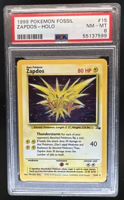 1999 Pokemon Fossil Zapdos #15/62 PSA 8 - Image 1