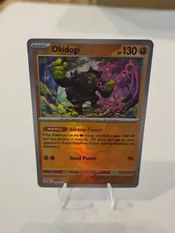 Pokemon TCG: Okidogi (Master Ball Pattern) Prismatic Evolutions 057/131 - NM - Image 1