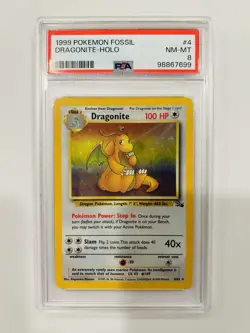 Pokemon Dragonite Fossil Unlimited Holo Rare #4 PSA 8 - Image 1
