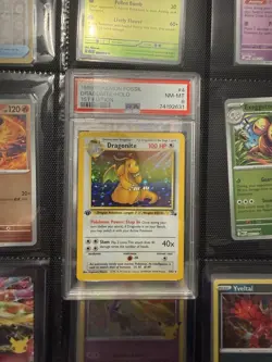 1999 POKEMON FOSSIL 1ST EDITION #4 DRAGONITE-HOLO PSA 8 - Image 1