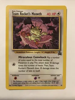 Team Rocket's Meowth Black Star Promo Pokemon Card #18 - Image 1