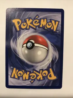 Team Rocket's Meowth Black Star Promo Pokemon Card #18 - Image 2