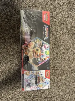 Pokemon TCG Scarlet & Violet Prismatic Evolutions Suprise Box & Booster Bundle - Image 1