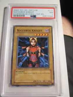 2002 YU GI OH CARD LEGENDARY BLUE EYES PSA GRADED NM 7 - Image 1