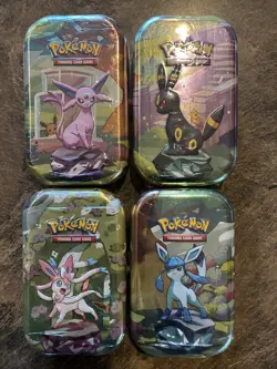 Pokemon TCG Prismatic Evolutions Mini Tins - Lot Of 4 Factory Sealed Tins - Image 1