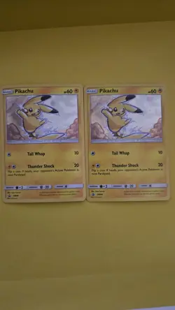 2x 2017 Pokemon Sun & Moon Black Star Promo SM98 Pikachu Cosmos Holo NM - Image 1